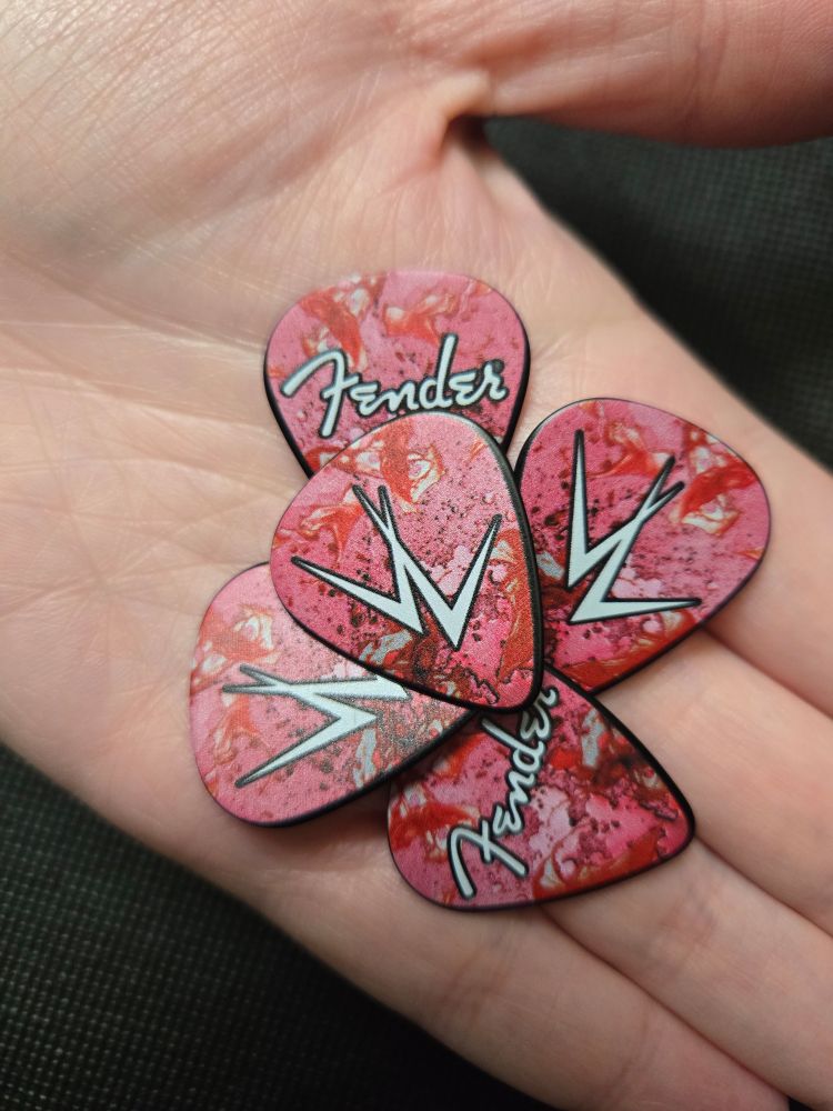 Handful of custom Vampire Lestat guitar picks