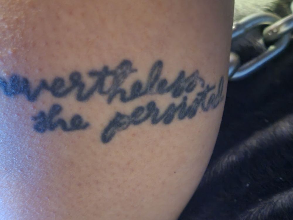 "nevertheless she persisted" in black ink and cursive