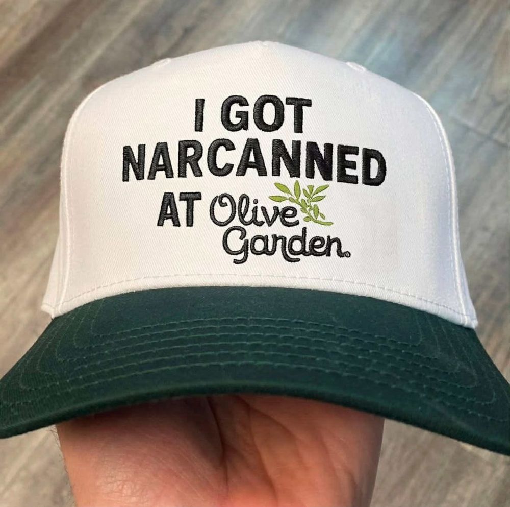 white hate that says i got narcanned at olive garden