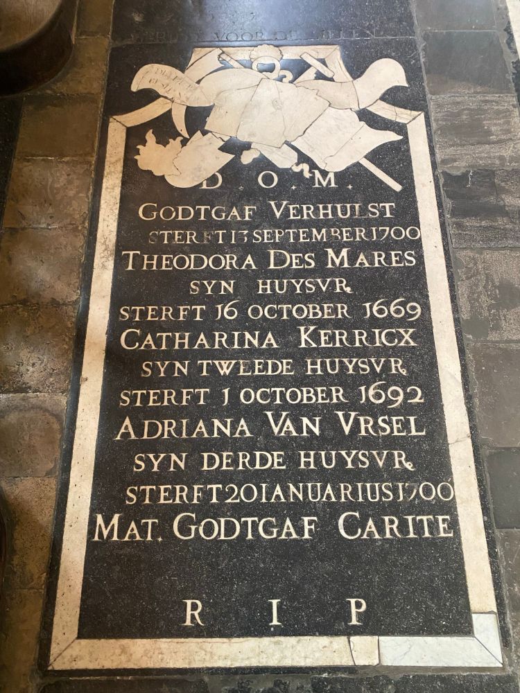 Ledger stone from Our Lady cathedral in Antwerp of Godtgaf Verhulst, who died 13 September 1700. Below Verhulst, the stone lists three successive women who died in 1669, 1692 and 1700, described as his wife, second wife and third wife. 
