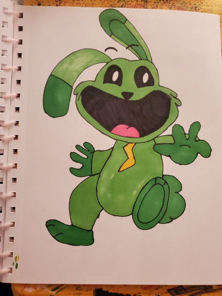A green bunny hopping with a lighting bolt necklace