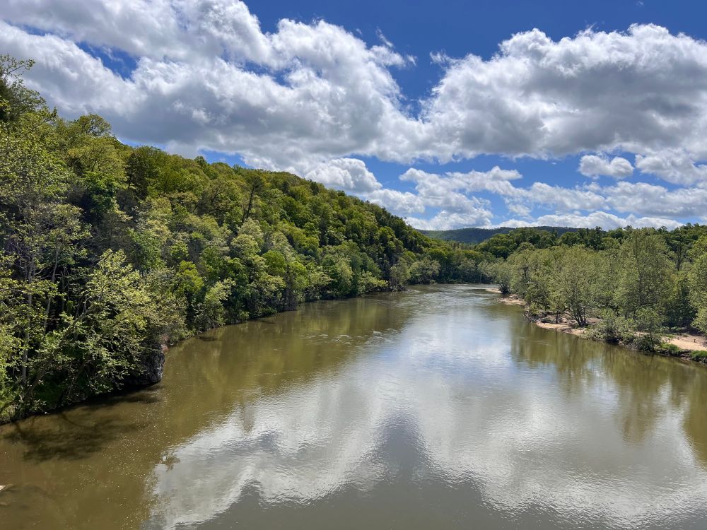 A river with a blue sky.
