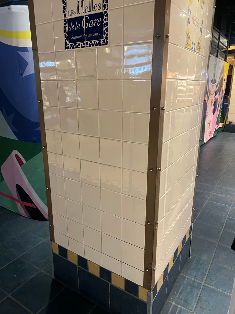 Vacant store with vague outline for the outline of the Velcro once holding my signs, no longer there