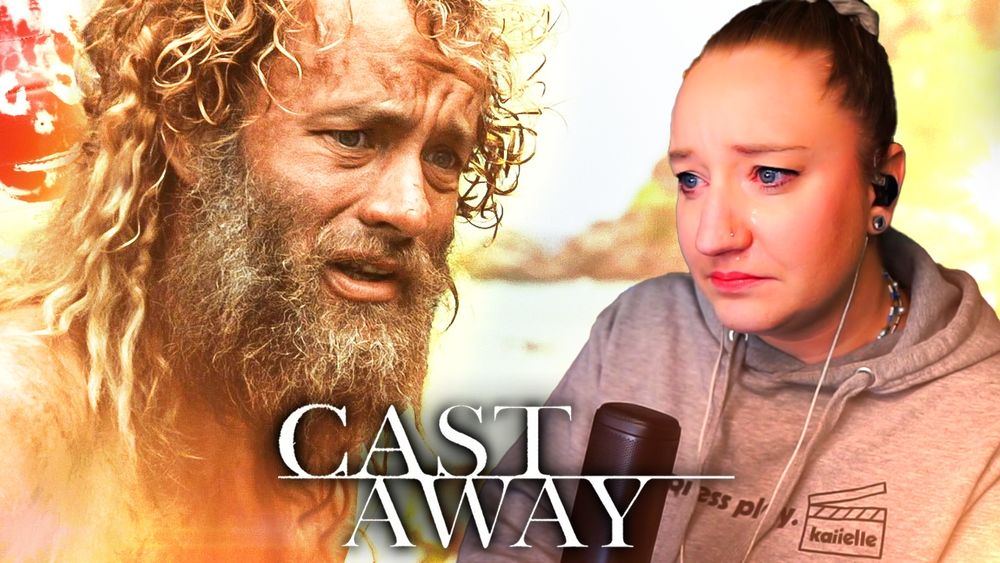 YouTube thumbnail for my reaction to watching Cast Away for the first time, featuring an image of KL visibly emotional alongside an image of Tom Hanks from the film and Wilson the volleyball behind him in the upper left corner.