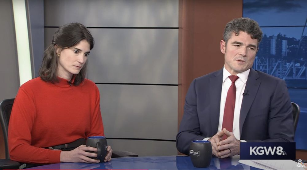 Marie Gluesenkamp Perez in a debate with Joe Kent looking shocked at something he said.