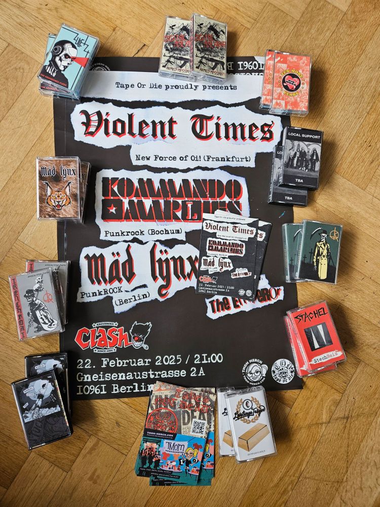 A show Poster on a hardwood floor, surrounded by cassette tapes and show flyers advertising the same event. The bands on the poster are Violent Times (oi from Frankfurt), Kommando Marlies (punkrock from Bochum), Mäd Lynx (punkrock from Berlin). Aftershow party by DJ Emperor. Venue is Clash Berlin, Gneisenaustraße 2A, 10961 Berlin. Date is February 22. Begin 9pm.