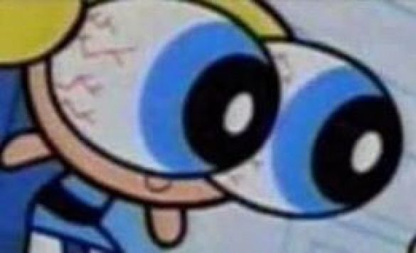 Bubbles from the Powerpuff Girls. Her eyes are cartoonishly popping out of her head while smiling, clearly liking something she’s seeing.