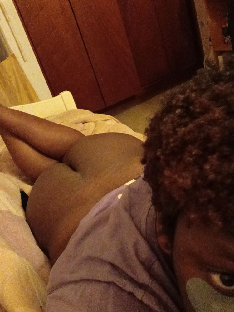 On my bed, laying on my belly with my shirt slightly up, butt and legs exposed. 