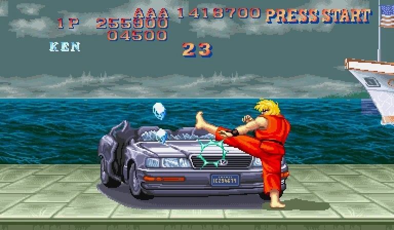 Screengrab from Street Fighter II of Ken in the car-breaking bonus stage.
