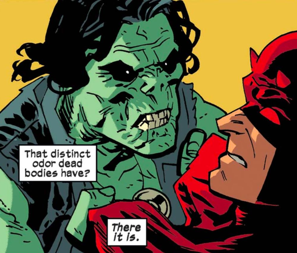 Simon Garth (Zombie) grabbing Daredevil. Daredevil remarks about the smell of dead bodies.