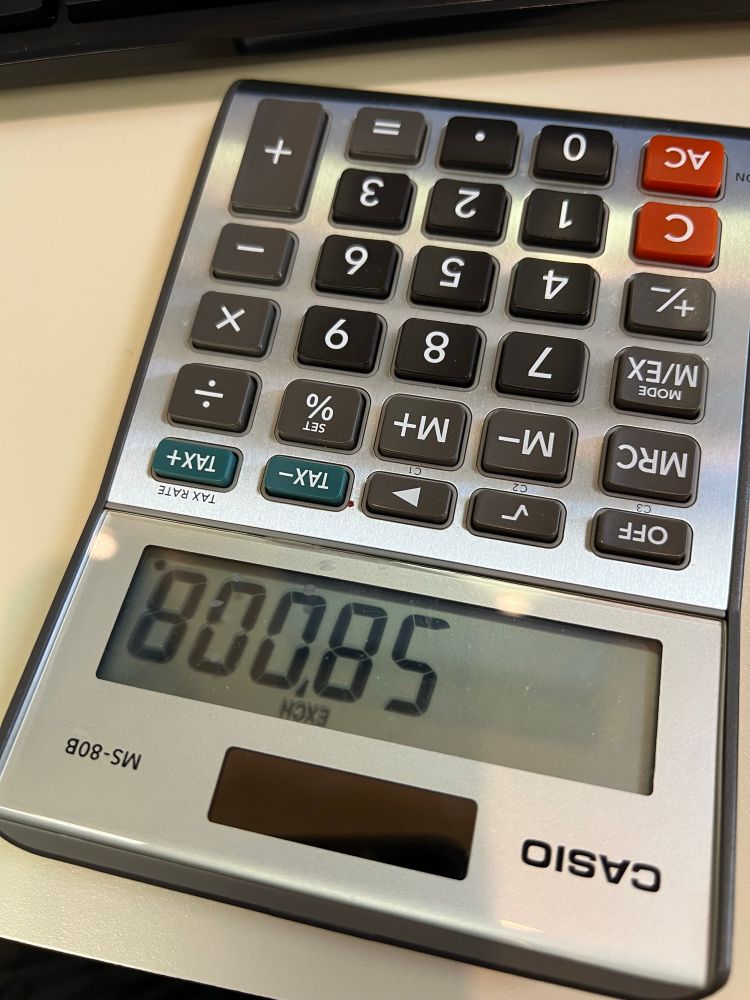 A calculator turned upside to read BOOBS