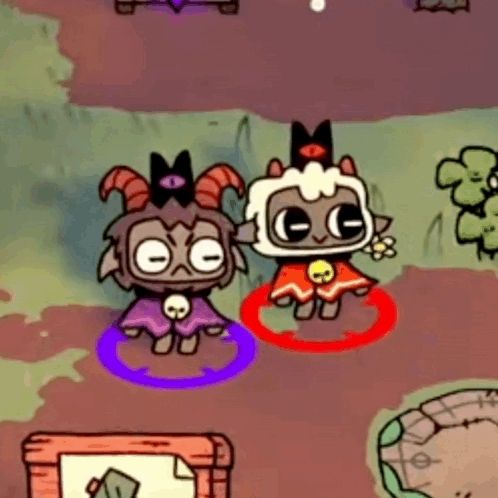 a couple of cartoon characters are standing next to each other in a video game .