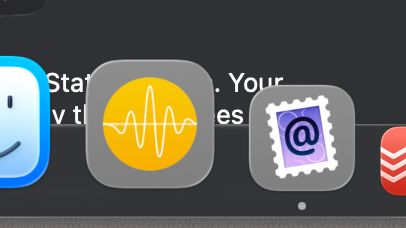 a screenshot of the macos tahoe dock, with two icons imprisoned in a glass squircle: the first one for swinsian which is a yellow circle with a wave, and the second for mailmate which is a purple post stamp with an @