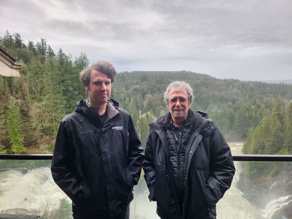 Photo of me and my dad standing above Snoqualmie Falls near Seattle less than two years ago