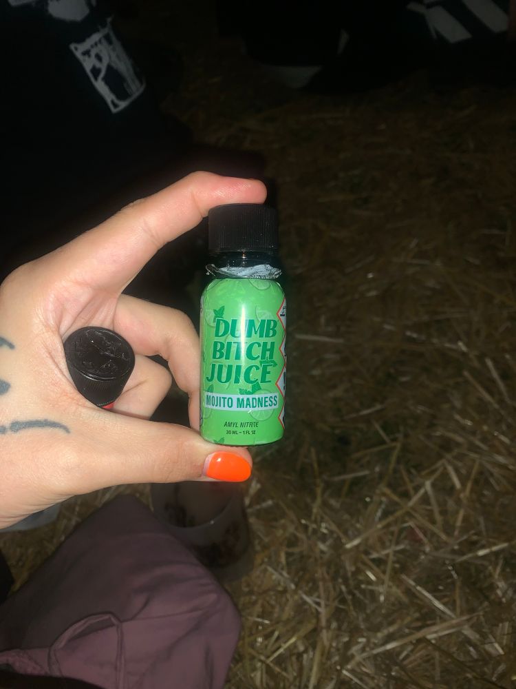 label reads “dumb bitch juice mojito madness”