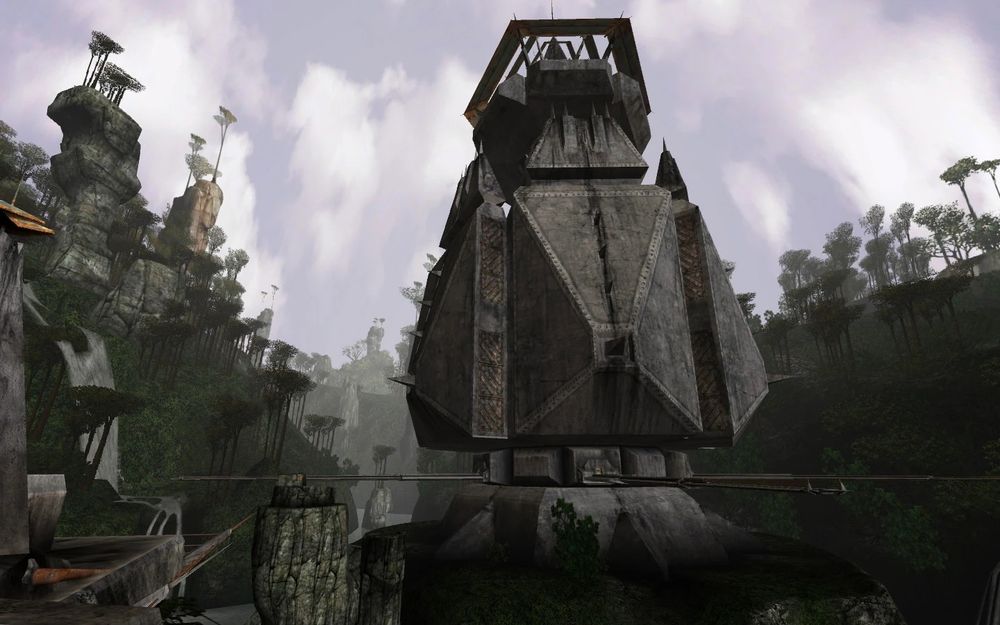 massive rotating concrete structure competing in size with the highest pillars on the sides of a forested valley