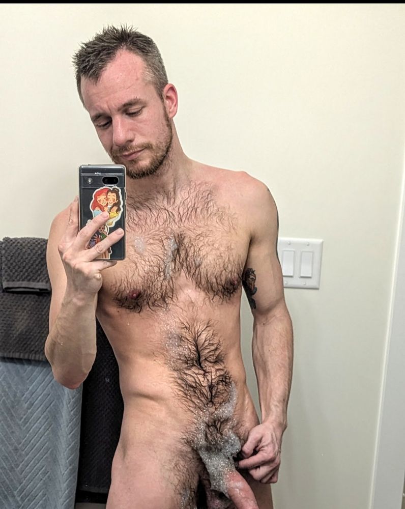 Mirror selfie, post bath with bubbles, showing shaft. 