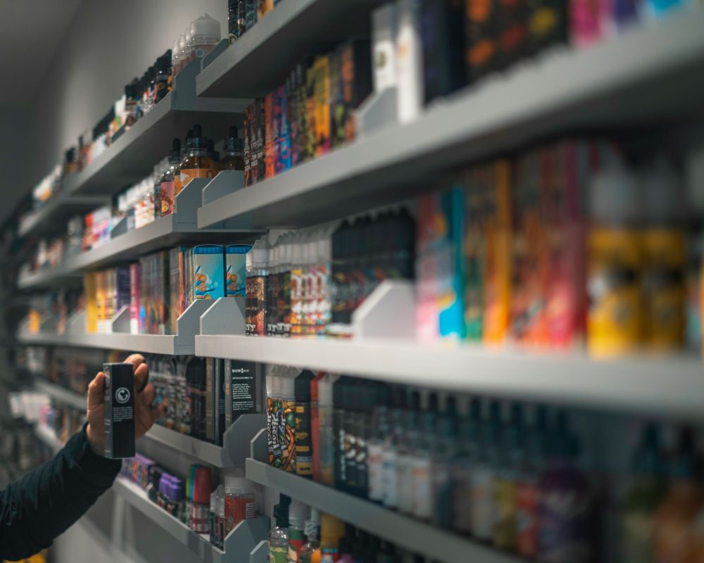 A photo of vapes on shop shelves