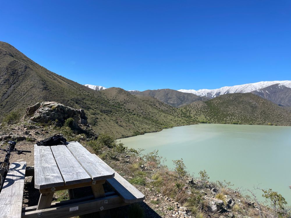 A picnic table on the trail. 