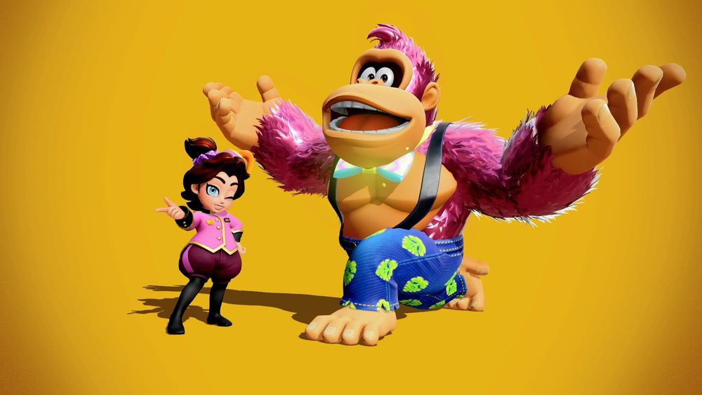 Screenshot of Pauline, dressed in a little hotel staff uniform, and Donkey Kong in shiny pink fur, a blue pair of denims, and a disco bow tie. 