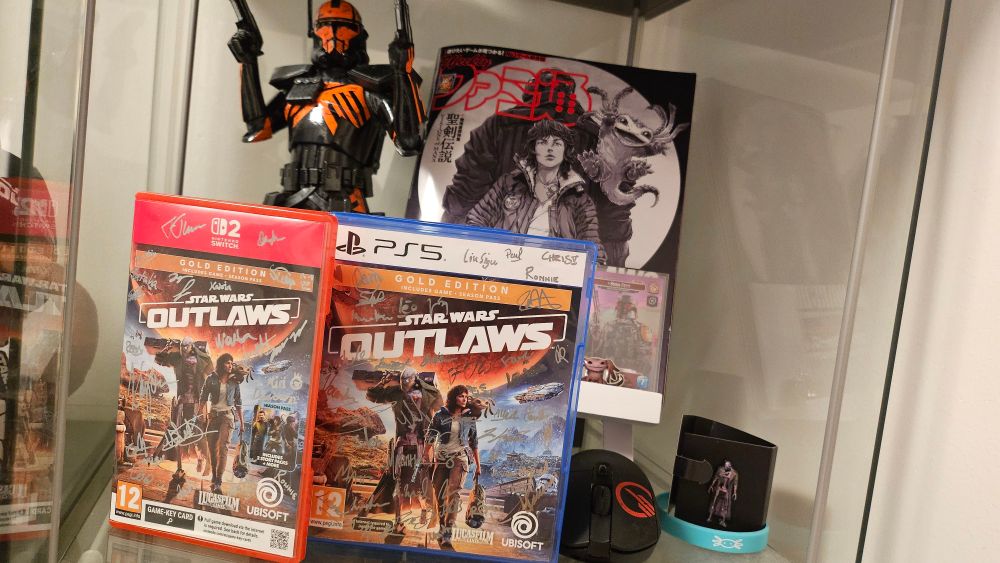 Photo of game copies of Star Wars Outlaws.
