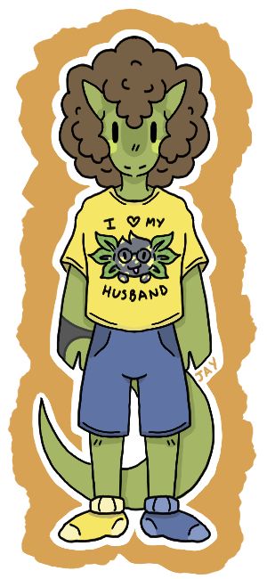 A green lizard with big brown puffy hair. They are wearing a yellow shirt with an axolotl on with words saying ‘I love my husband’, a pair of blue shorts and two mismatched socks - one coloured yellow and the other coloured blue. On their right hand they are wearing a drawing glove.
