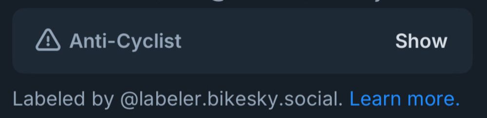 screenshot of a bluesky post that had been hidden behind an “Anti-Cyclist” label. it has a “Show” button on it and a caption that says “Labeled by @labeler.bikesky.social. Learn more”