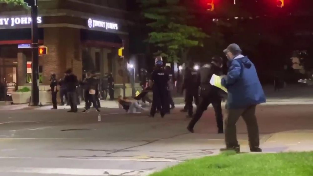 Kick by Erie Bureau of Police on protestor Hannah Silbaugh in Perry Square