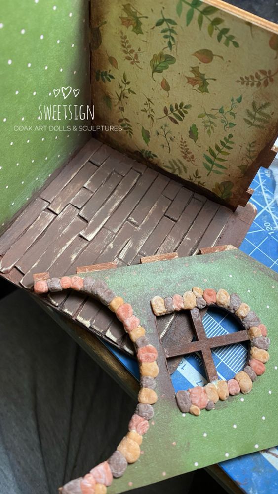 Walls and a floor of a miniature art doll house I’m making 