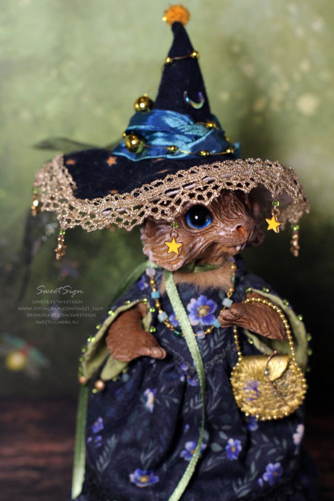 A blue eyed brown bunny in magical hat and dress, original fantasy art doll by Svetlana Polupanova (SweetSign)