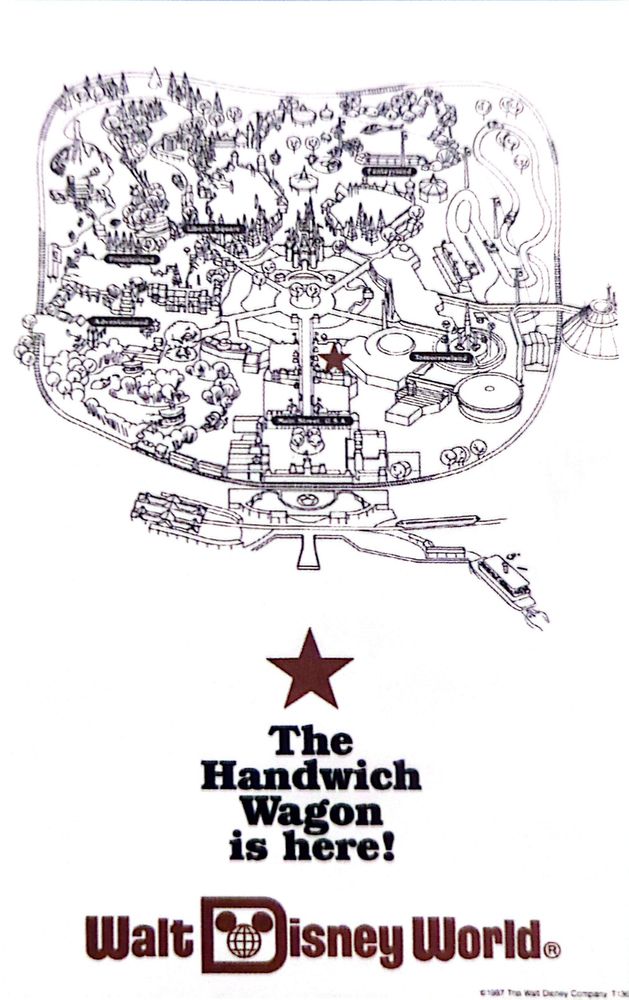 An old map of Magic Kingdom with a star

Underneath, the star is marked with "The Handwich Wagon is here!" 
