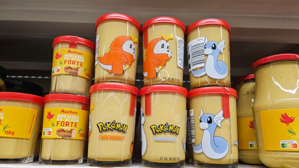 Jars of Mustard featuring Pokémon on them for some reason...? Has Fuecoco or Dratini on them.