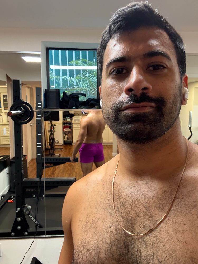 selfie while shirtless and showing off my butt in the reflection of the mirror behind me