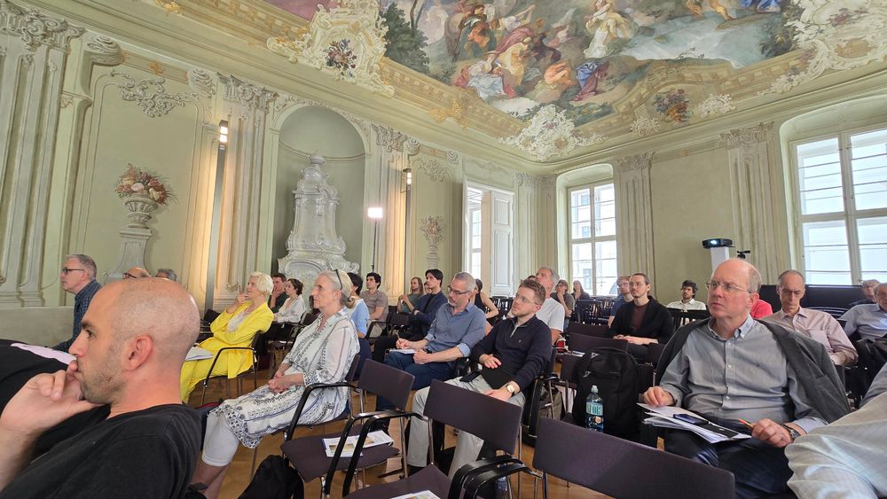 participants at free will conference in Vienna, Austria.