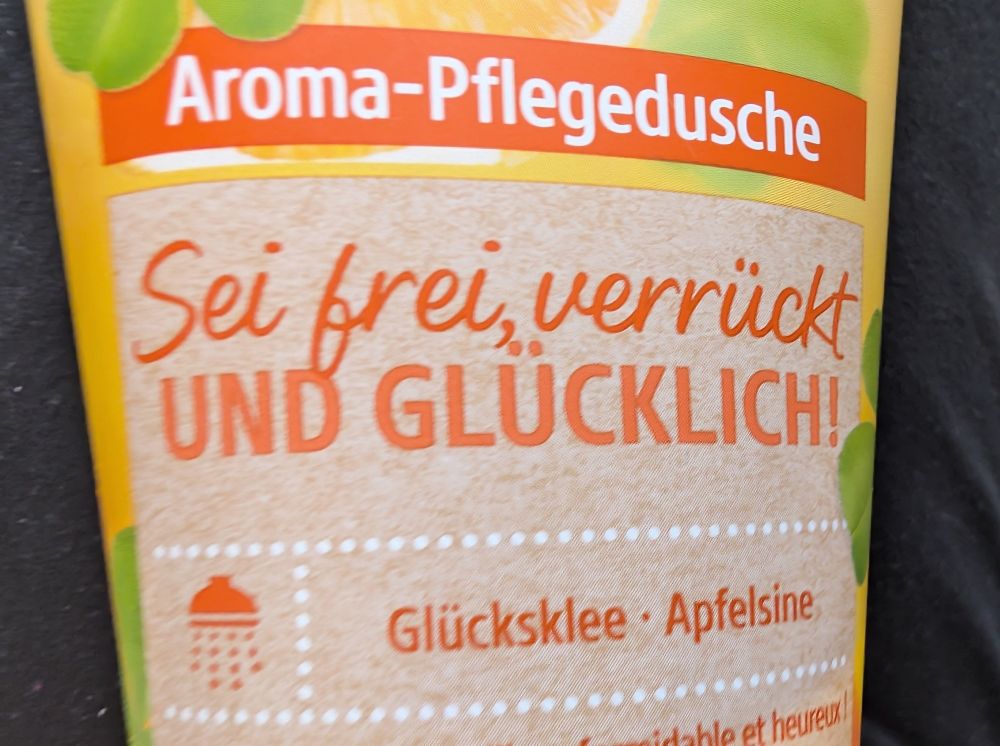 Aroma Pflegedusche mit dem Slogan "Sei frei, verrückt und glücklich"