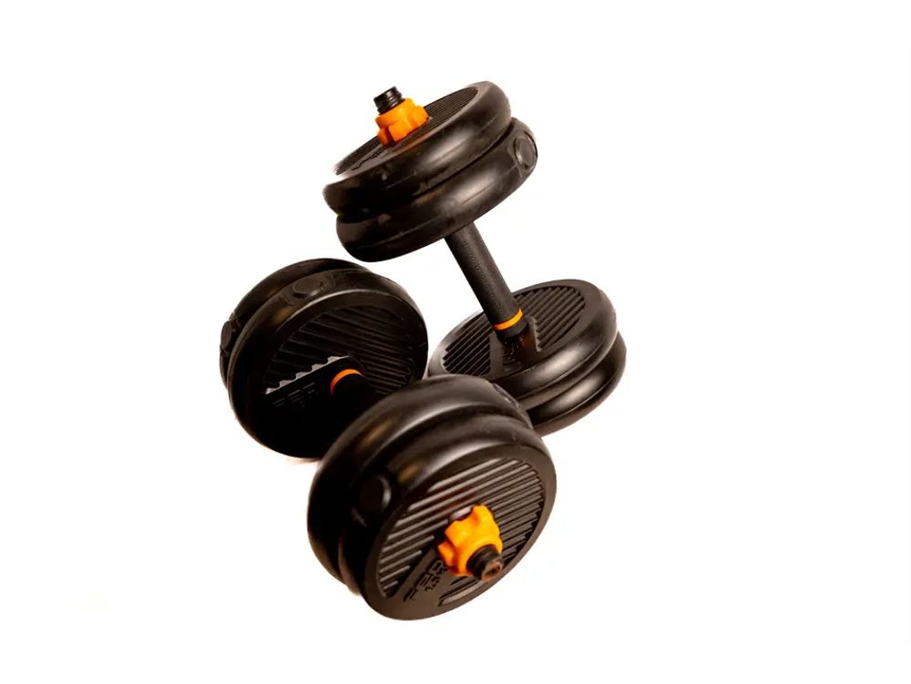 Pair of dumbbells made of durable plastic discs total 7KG each