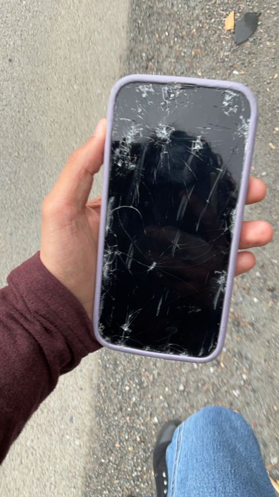 iphone 13 pro max with a really broken screen ☹️
also walking on the highway