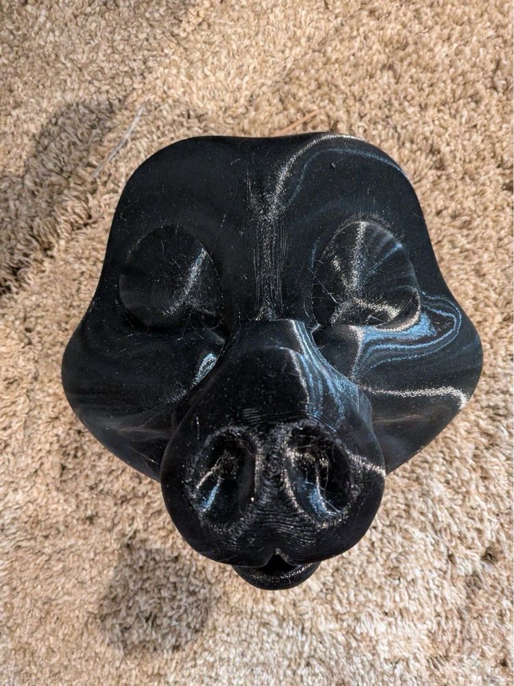 A pig fursuit head base printed in pla plastic