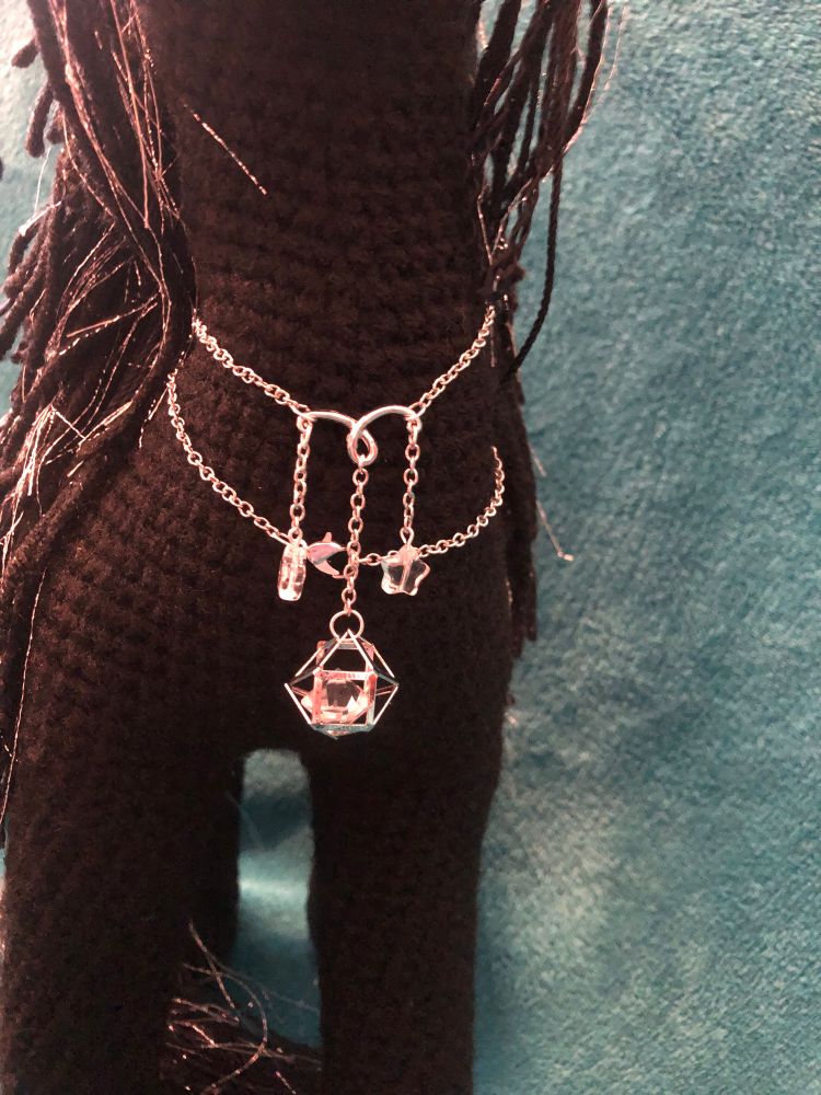 Featuring a lovely dangly necklace (that a human could wear, too!)