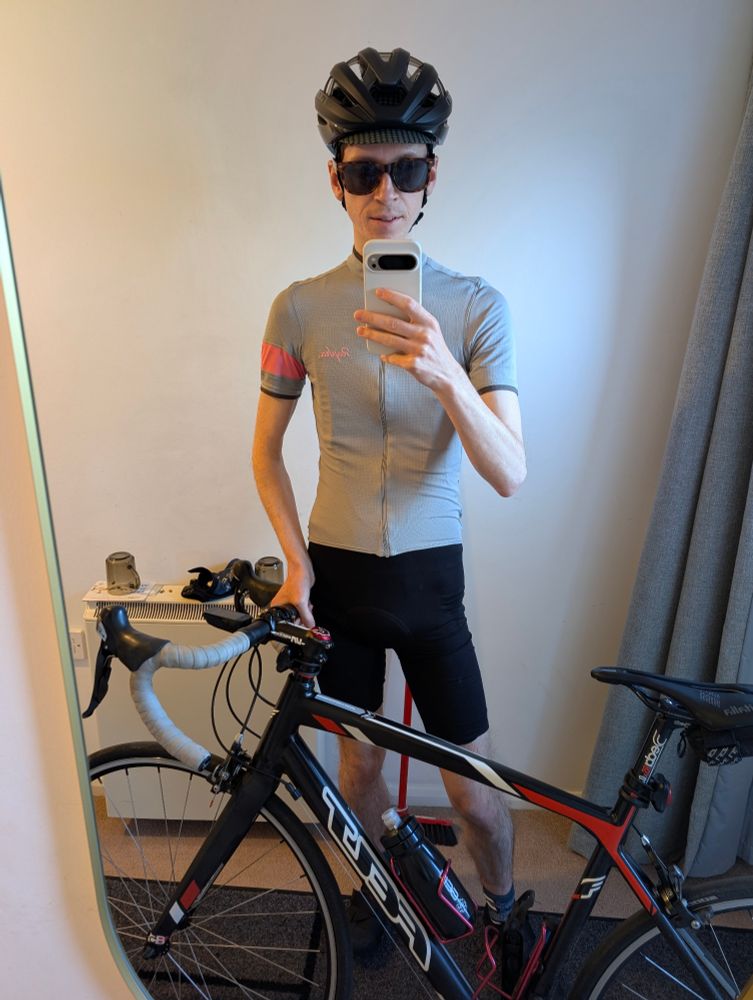 Just me in lycra with my black road bike in a mirror