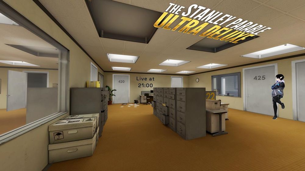 A promotional image featuring the office setting from The Stanley Parable: Ultra Deluxe. The game's gold title is displayed across the center ceiling panels. The text "Live at 21:00" is placed on the back wall above a small desk. A VTuber avatar, wearing a blue and white jacket, is standing on the right side of the room next to door 425.