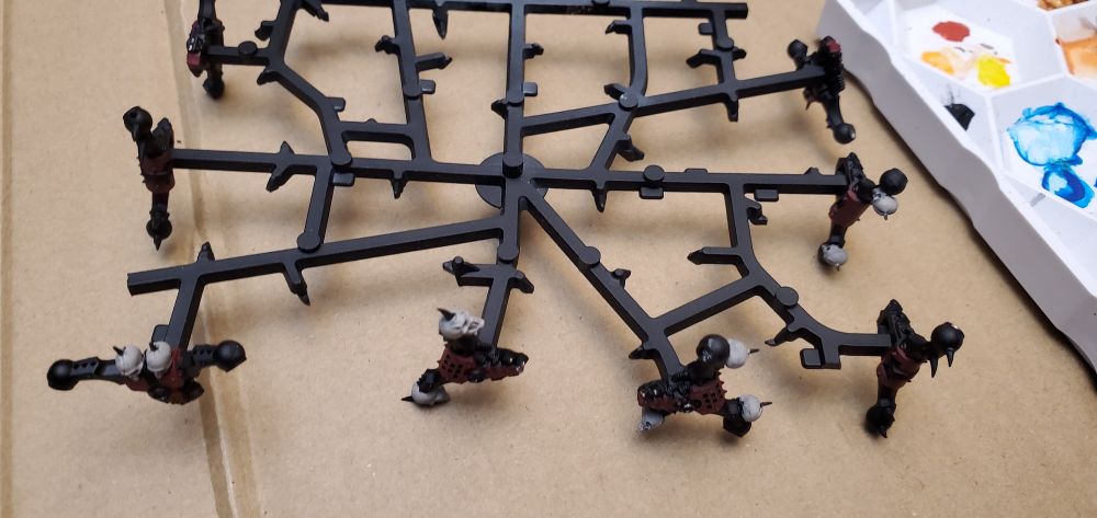 Bezerker backpacks in the process of being painted.