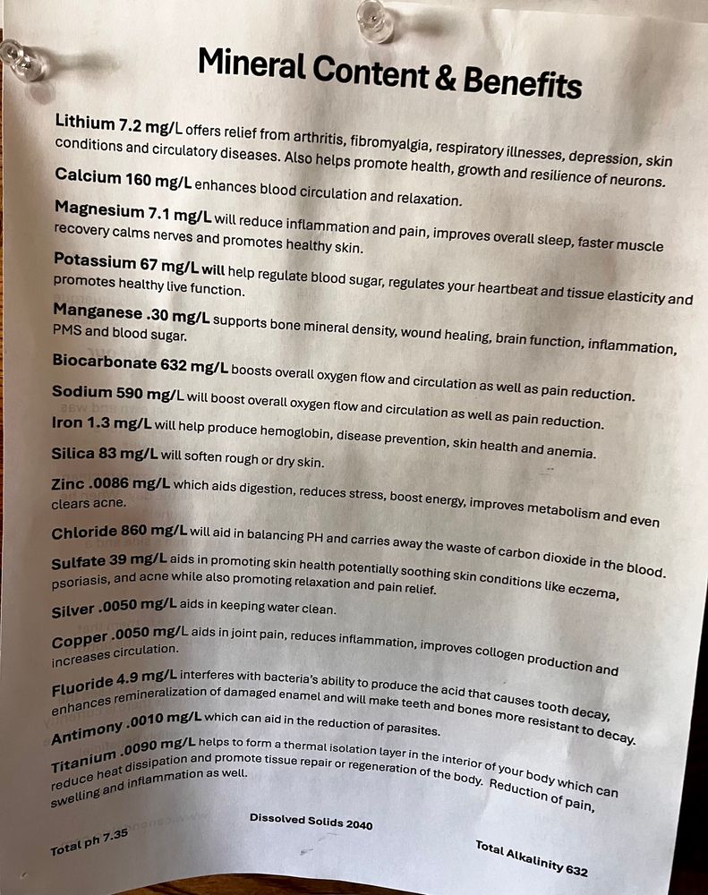 Mineral content of Jemez hot springs, printed on white paper and tacked to a bulletin board