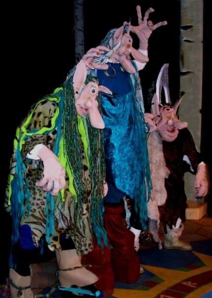 Three elaborately costumed trolls from the 2008 Portland Revels mummers’ play. 