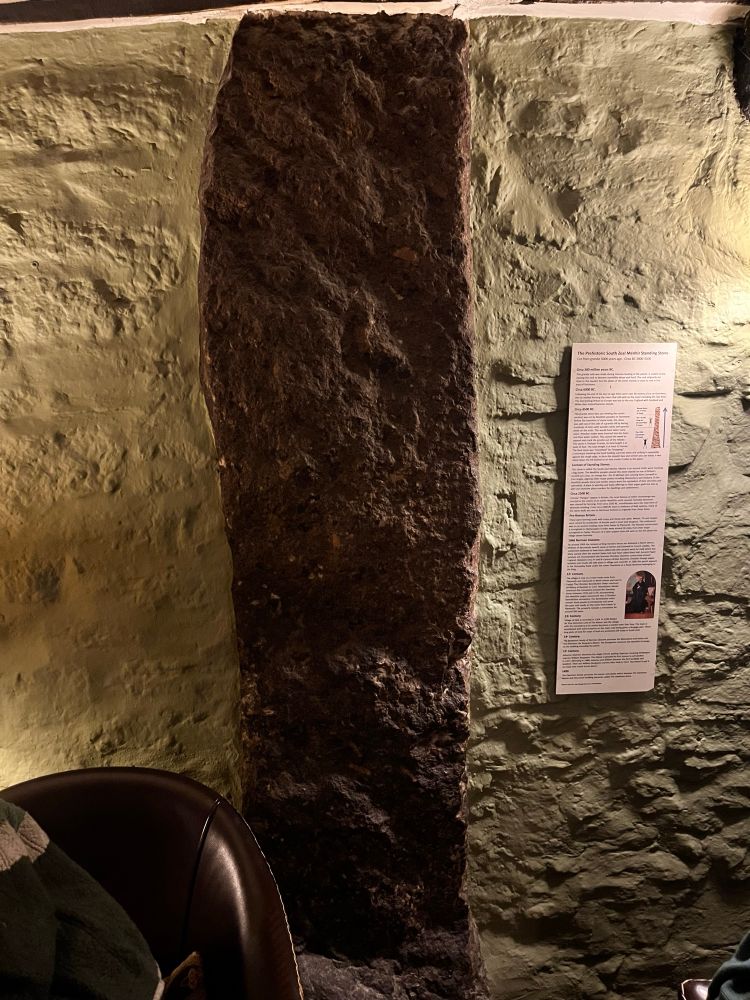 Ancient standing stone in a pub