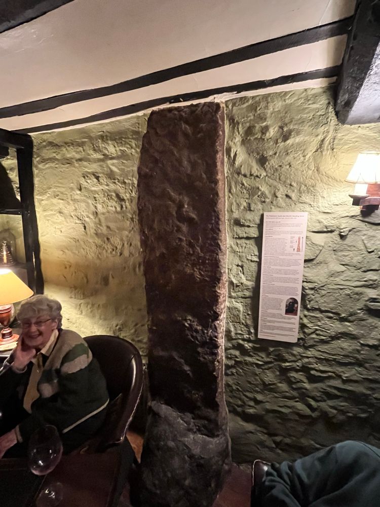 Ancient standing stone in the snug bar of a pub in Devon 