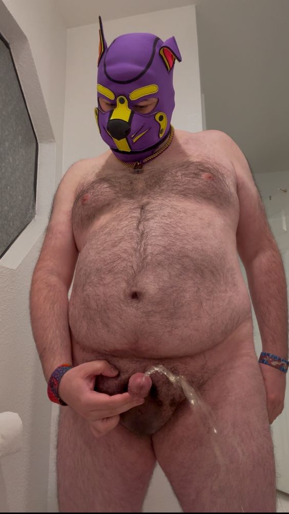 Me in my pup hood peeing towards the camera