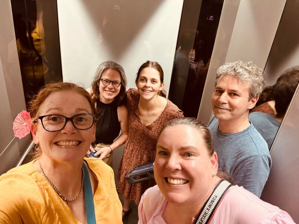 Elevator selfie with Shannon, Amanda, David, and Erin and Jordyn, smiling in the back.