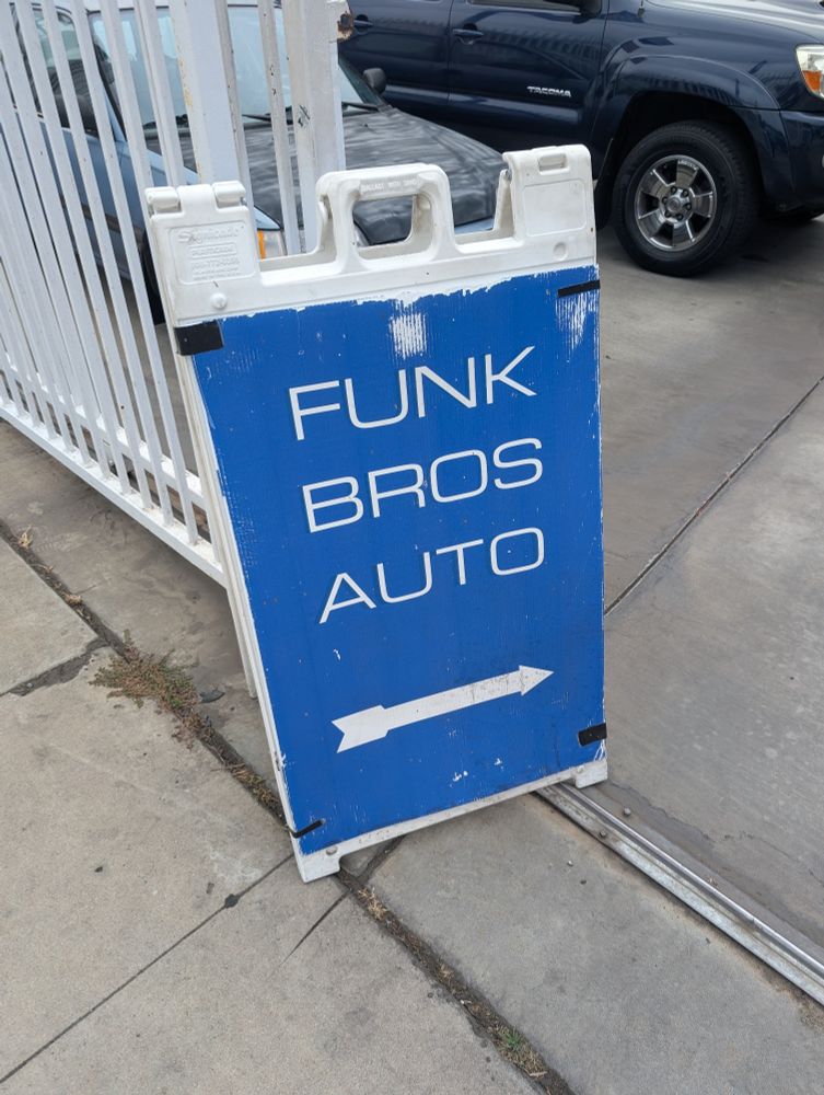 A standing street sign that says 
