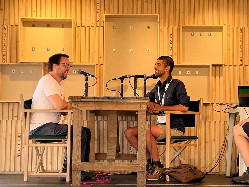 Ajay speaking on a podcast